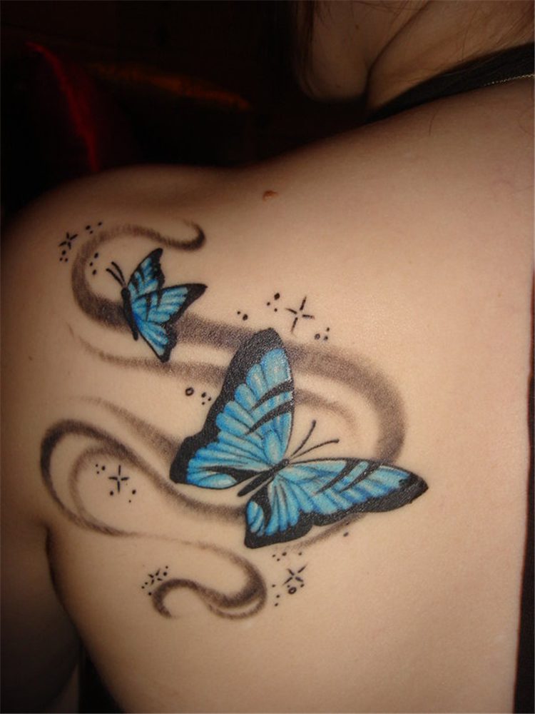 blue butterfly tattoo on shoulder female