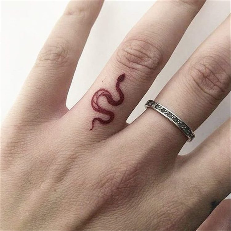 finger snake tattoo for female, finger tattoo ideas for females 
