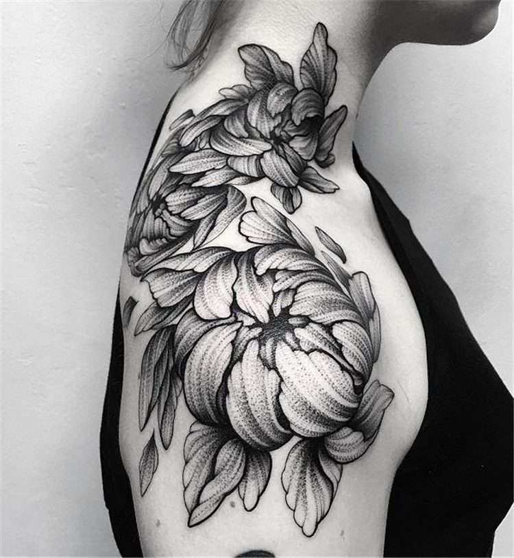 dense flower shoulder tattoo for female