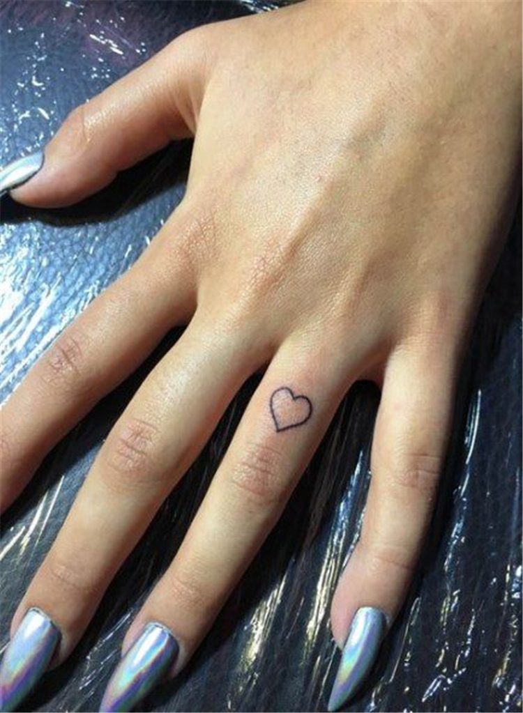 finger heart tattoo for female