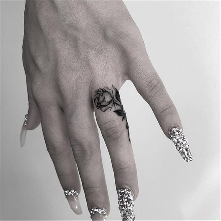 finger rose tattoo for female