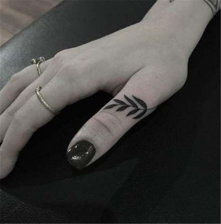 leaf tattoo on thumb for female, finger tattoo ideas for females 