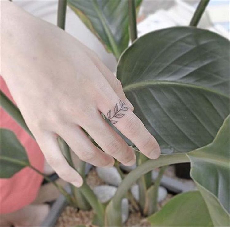 finger leaf tattoo for female, finger tattoo ideas for females 