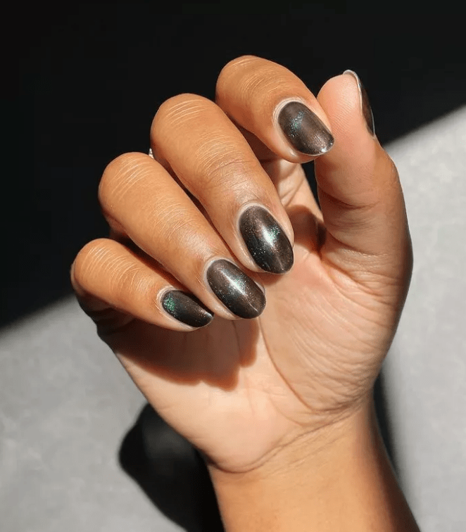 Bold Teal Accent on Brown Nails