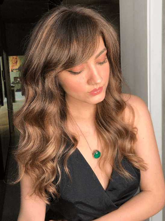 Classic Waves and Side-Swept Bangs