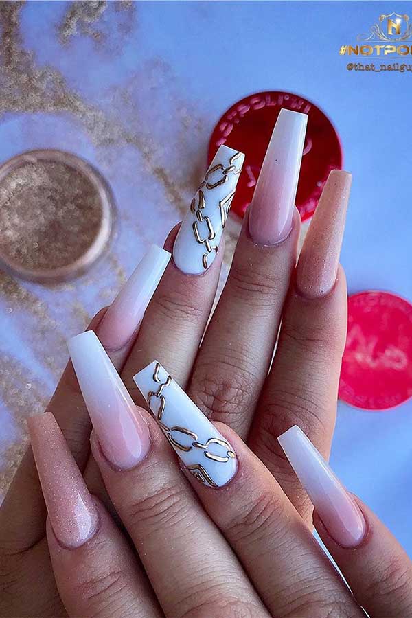white and gold nail design