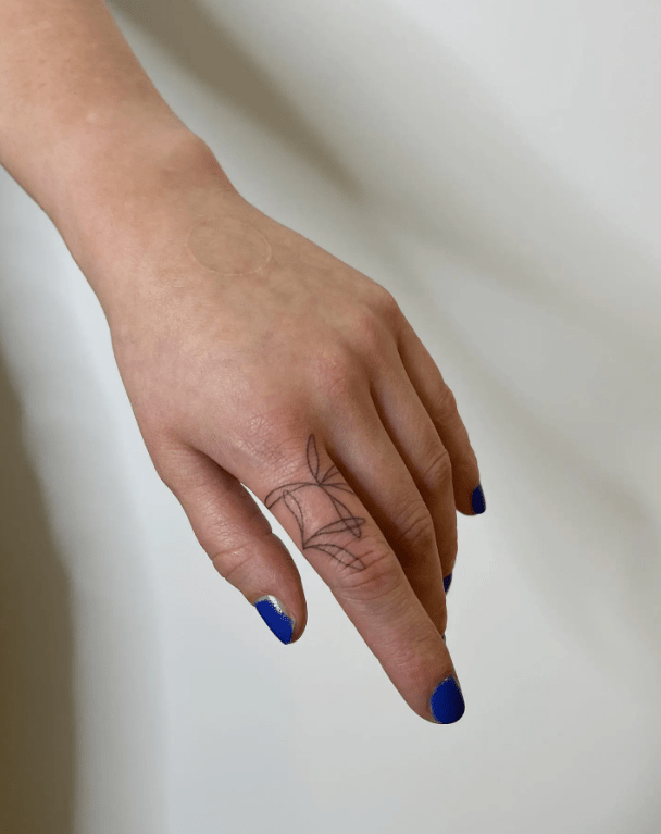 Minimal Lined floral Finger Tattoo, finger tattoo ideas for females